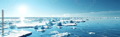 Stunning icy landscape with floating icebergs in calm ocean waters under bright sunlight and clear blue sky