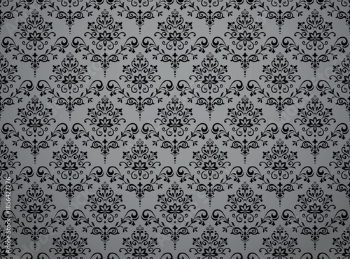 Wallpaper in the style of Baroque. Gray and black floral ornament. Seamless vector background. Graphic pattern for fabric, wallpaper, packaging. Ornate Damask flower illustration