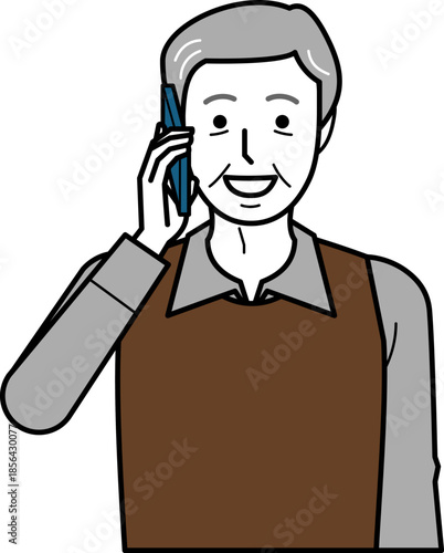 正面向き。スマホで電話するシャツとベストを着た高齢男性。