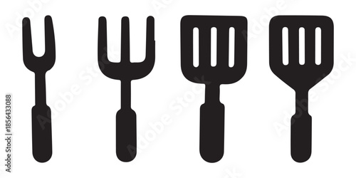 Collection of barbecue grilling tools including spatulas and forks.