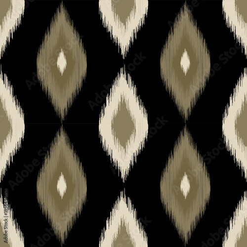Black ikat diamond seamless pattern with textured tribal look, ideal for fashion fabric, boho wallpaper, modern ethnic backgrounds, and home decor.