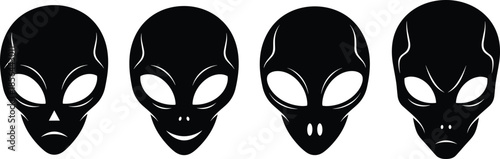 Set of four alien head silhouettes with large eyes and various facial expressions for sci-fi extraterrestrial life and space themes