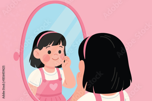 Smiling girl in a pink dress touching her cheek while looking into a mirror. A sweet moment of self-reflection.