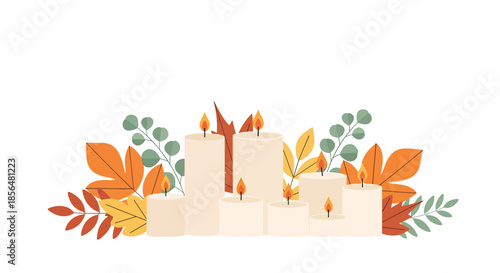 Cozy autumn scene with lit candles and colorful fall leaves