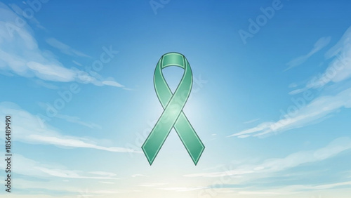 Mint green awareness ribbon against a clear blue sky with soft clouds symbolizing hope and support for various causes isolated
