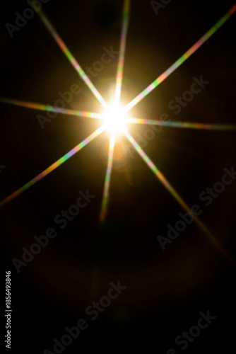 Abstract sun flare. The lens flare is subject to digital correction