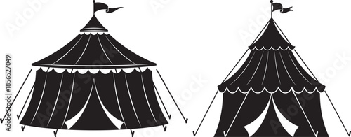 Two black circus or carnival tents silhouettes