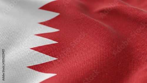 Bahrain national flag waving smoothly in the wind. High-quality animated background representing sovereignty, government, freedom, and Arab nation concepts.