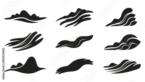Set of abstract black mountain and wave silhouettes in various shapes.
