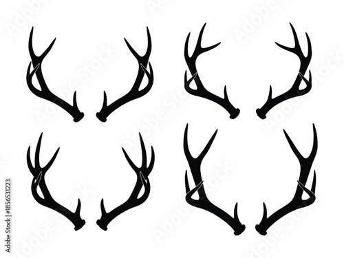 A collection of black silhouette deer antlers displayed in a grid pattern
