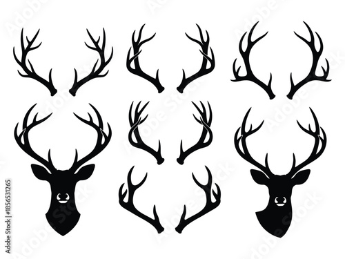 Diverse collection of black silhouette deer antlers and head shapes displayed