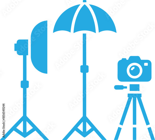 Blue of camera equipment and umbrella on tripods