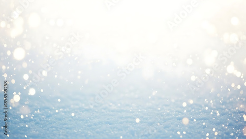 Soft winter snowflakes sparkling against a light blue background  