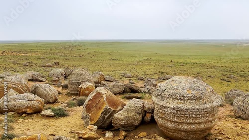 View of the valley of stone balls. Mangystau region.Unique natural places of Kazakhstan. Valley of the Balls. Spherical formations in the Torysh tract were formed about 120-180 million years ago. 4К