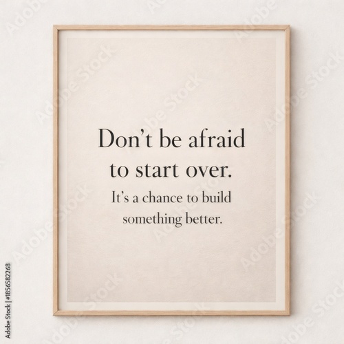 Minimalist motivational quote typography on neutral textured background