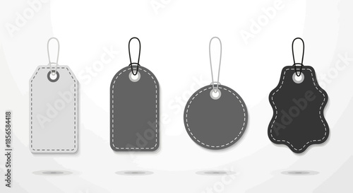 Four different shaped blank price tags with stitched edges and hanging loops, isolated on a white background.