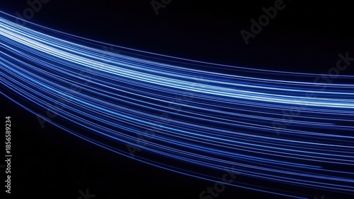 Abstract blue light trails on black background