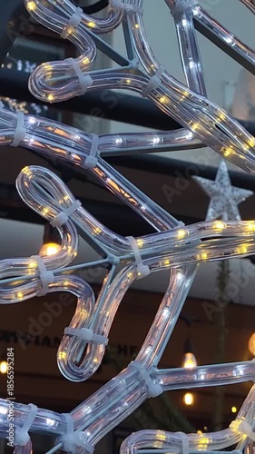 Snow flake led closeup white yellow bent light sparkling blinking Christmas day street joy celebrations