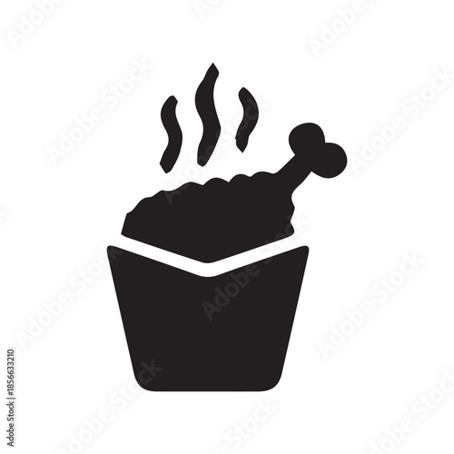 Steaming hot crispy fried chicken drumstick in a takeout bucket