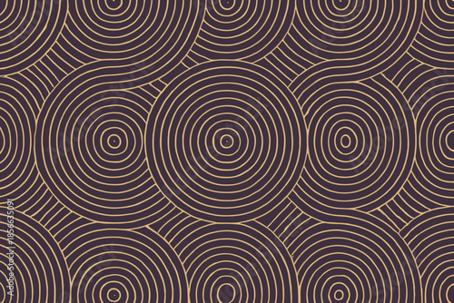 Circular patterns fill the surface in brown and beige tones that create an abstract design across the canvas