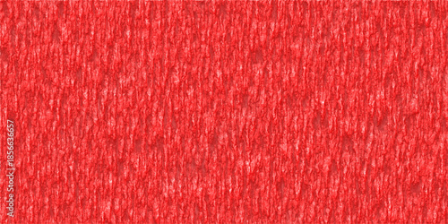 Close-up view of a vibrant red textured fabric with a subtle vertical ribbed pattern, showcasing its detailed surface.