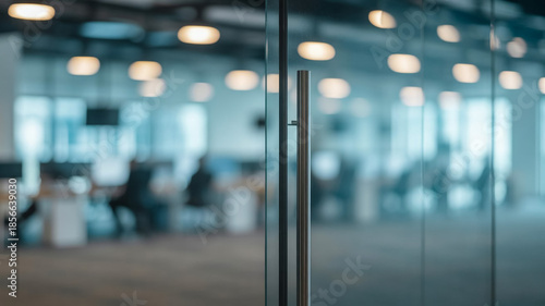 A modern office interior with a blurred background and a glass door