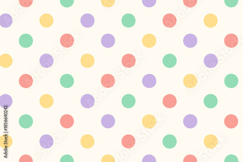Bright colored dots scattered on light background for pattern design or decoration purposes