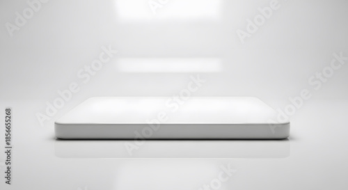 Minimalist White Display Platform for Product Showcase with Soft Reflections and Clean Background Ideal for Studio Photography and Presentation