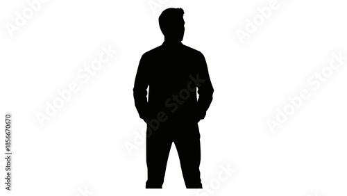 Silhouette of a man standing with hands in pockets.