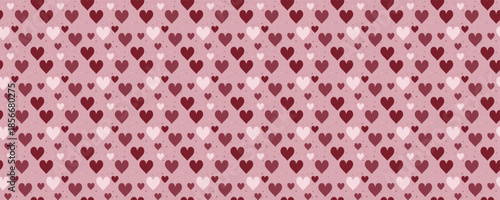 Seamless heart pattern with pink and red hearts on soft background. Cute love print perfect for Valentine's Day cards, gift wrap, or romantic wedding decor and greeting designs.