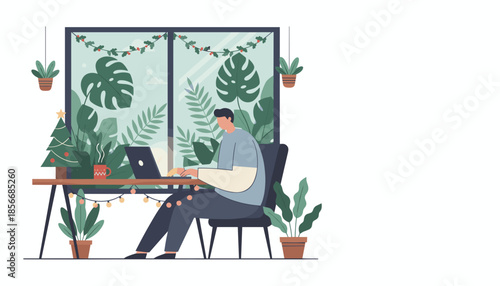 Man working remotely on a laptop in a cozy plantfilled home office decorated for the Christmas holidays