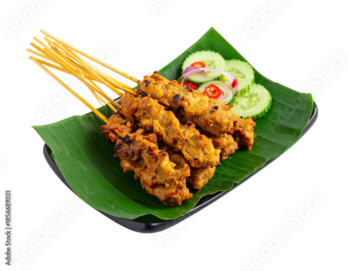 Delicious Chicken Satay Skewers Served on Banana Leaf.