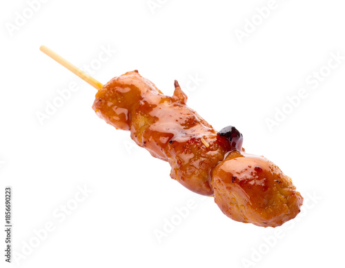 A single grilled meat skewer with a glossy glaze isolated on a white background.