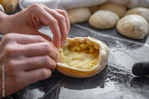 Hand Shaping Fried Pies with Savory Potato and Fried Onion Filling