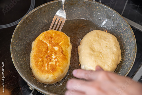 Fried Pies Made from Yeast Dough in a Hot Pan