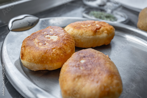 Fried homemade pies made from yeast dough