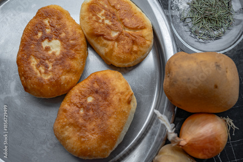 Fried homemade pies made from yeast dough