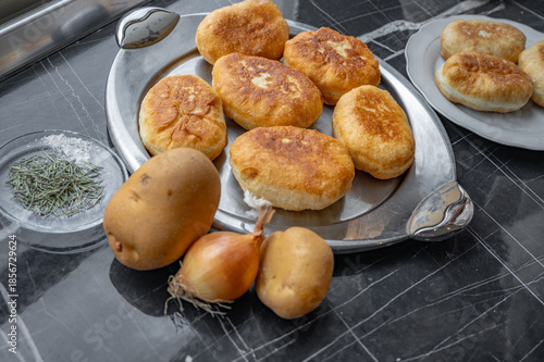 Fried homemade pies made from yeast dough