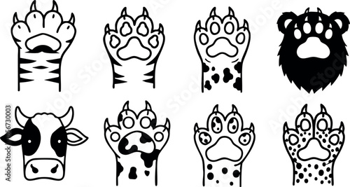 Animal paw prints and head icons including tiger, leopard, cow, and bear in black and white vector set