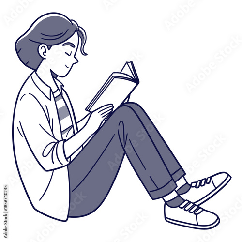 A young person is comfortably seated deeply engrossed in reading a book with focused attention