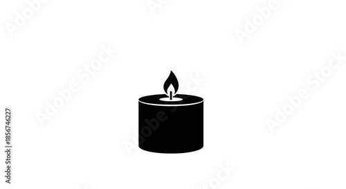 Black candle with a flame burning.