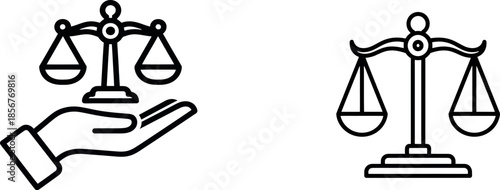Hand holding scales of justice
