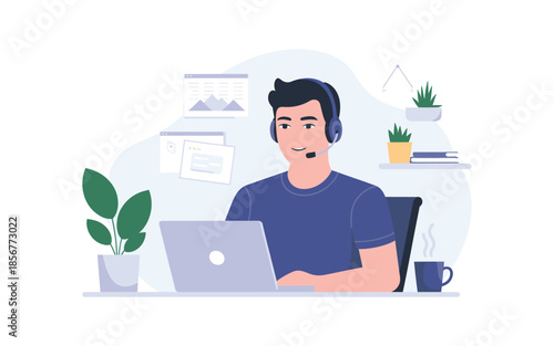 Smiling young man wearing headset working on laptop at modern home office desk