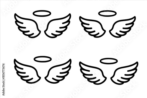 Four Angel Wings with Halos on Dark Background