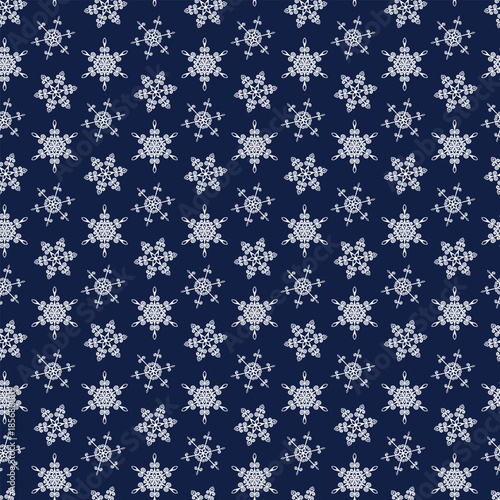 Winter seamless pattern with snowflakes, holiday background. Vector illustration for fabric, textile wallpaper, posters, gift wrapping paper. Christmas vector illustration. Falling snow.