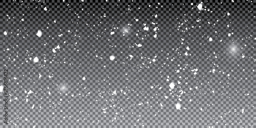 Real snowfall over transparent background. Abstract snowy white particles falling for winter weather overlay or cold snowfall background. Heavy snow storm.