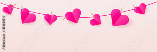Horizontal empty banner with a garland of paper hearts. Romantic banner or flyer concept for Valentine's Day holiday with empty space for your design. Background for social media, website banner or pr
