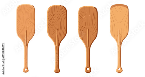 Collection of four wooden pizza peels with distinct grain patterns and shapes