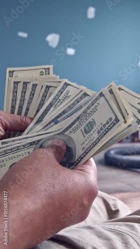 A Close Up Vertical Shot Showing Male Hands Counting Dollar Bills Demonstrating Cash Payment, Salary Control, Personal Finance Handling, And Authentic Texture Of Real Currency