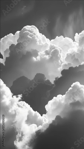 A serene scene with a sunlit break in the dark clouds.